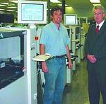 Martin Vermaak (technical support engineering manager, Shurlok) and Chris Serafini (director, Hawker Richardson SA) at the commissioning of the most high-technology production line in the country